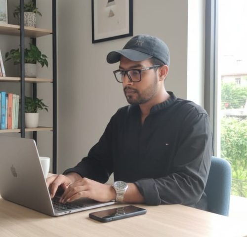 Suman Das SEO specialist and digital marketer working on laptop